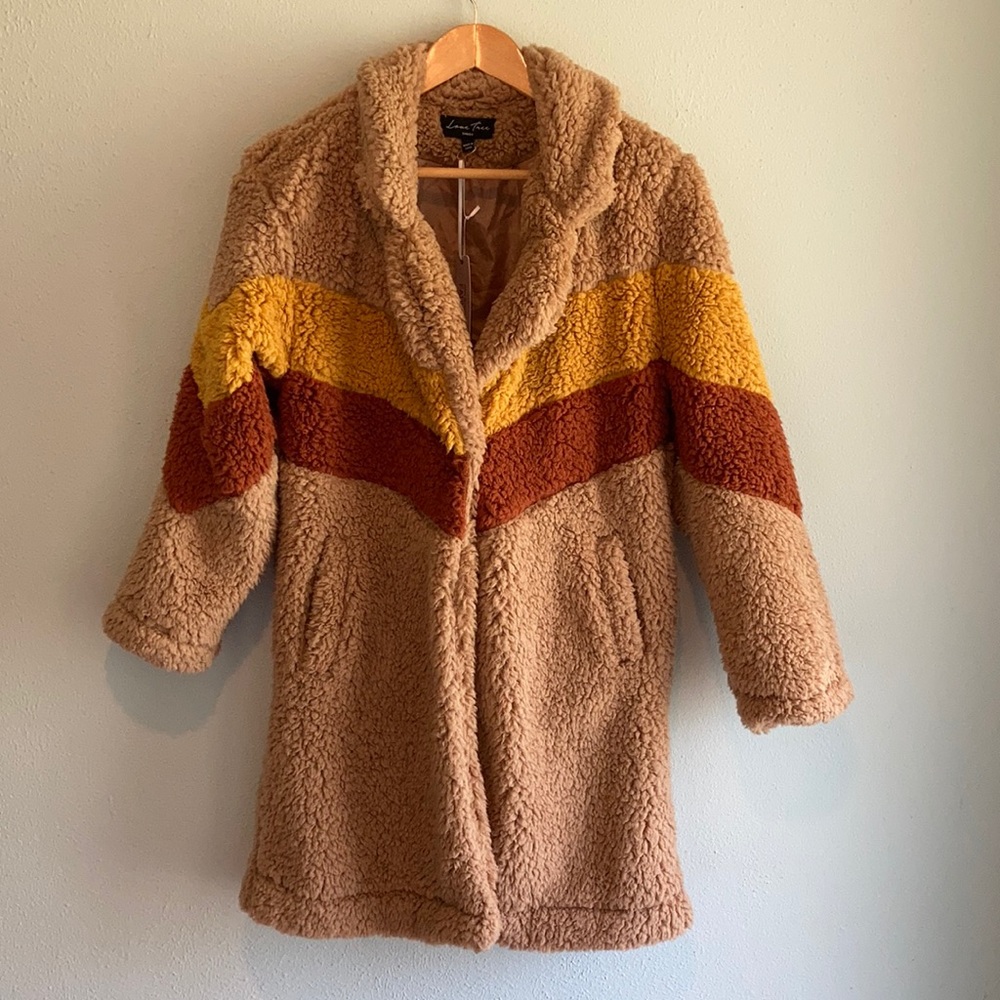 NWT. Love Free jacket with pockets. Size S.